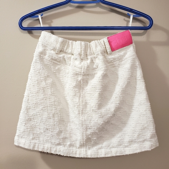 Chuu - Heart cutout white textured mini skirt - Size 26 - Picture 3 of 5